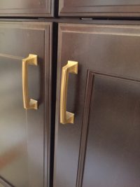 We chose the same pulls in a lighter tone for our island cabinets, which are maple in a dark finish. 